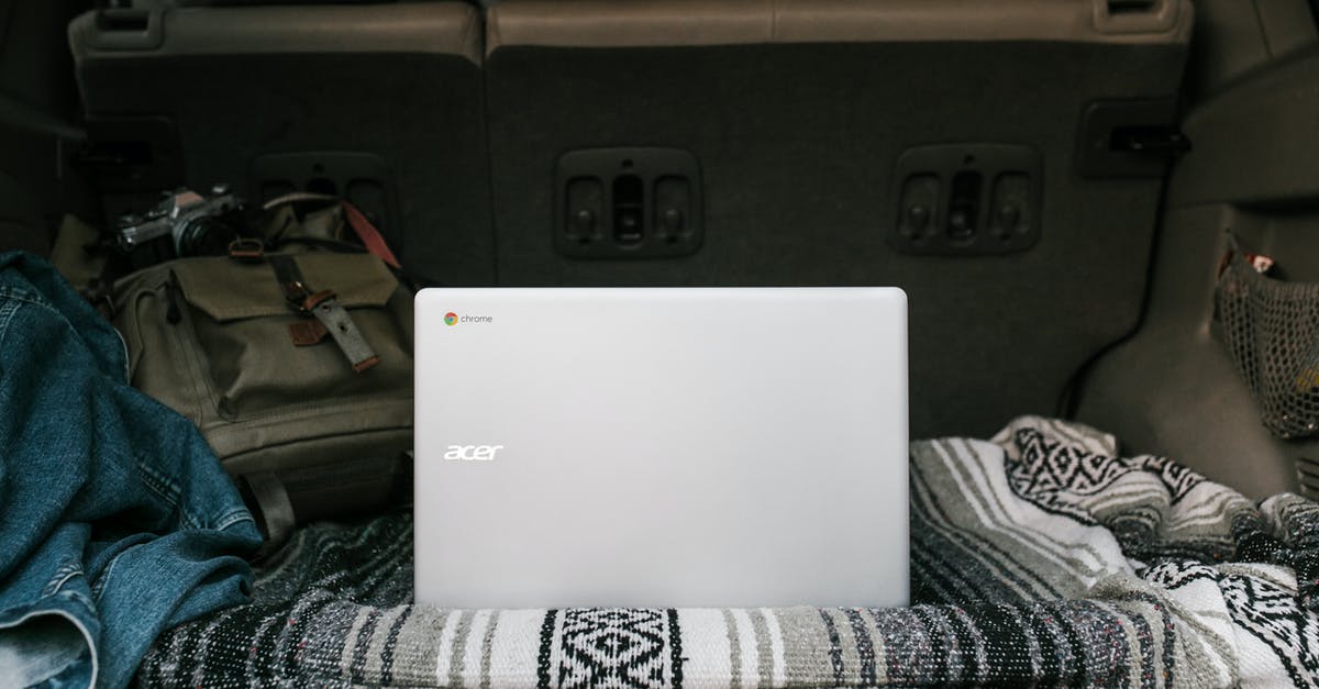 I am a nomad (traveler), where is my home? - White Asus Laptop on Gray Car Seat
