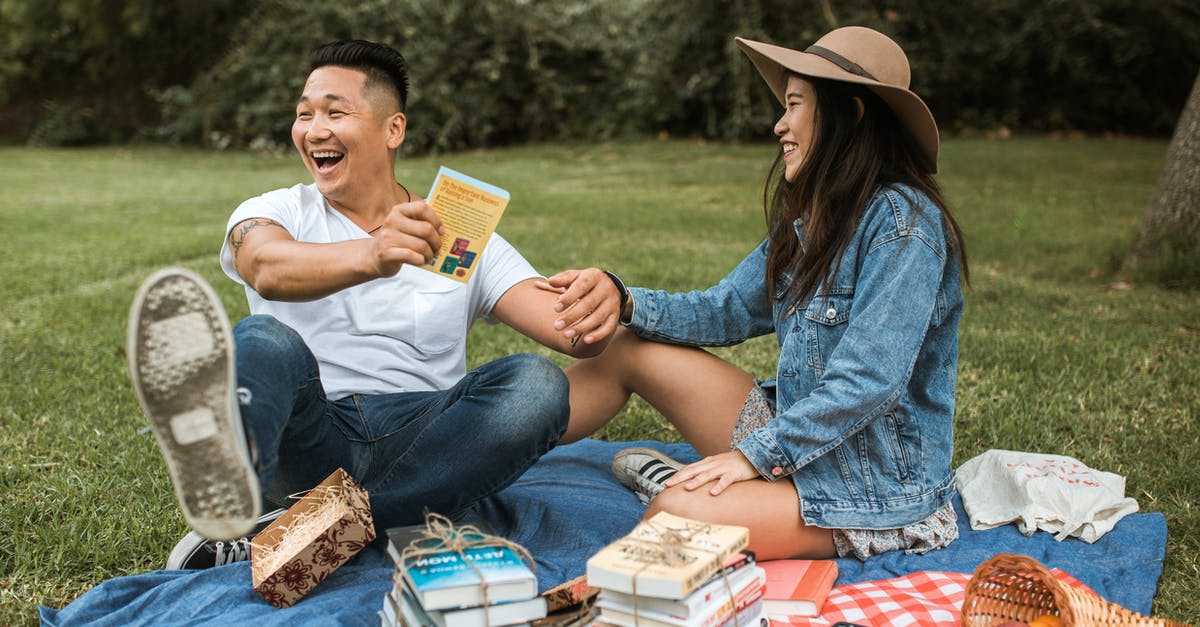 I don’t understand my British Passport Expry date [duplicate] - Man in White T-Shirt Holding a Book and Sitting Beside Woman in Hat