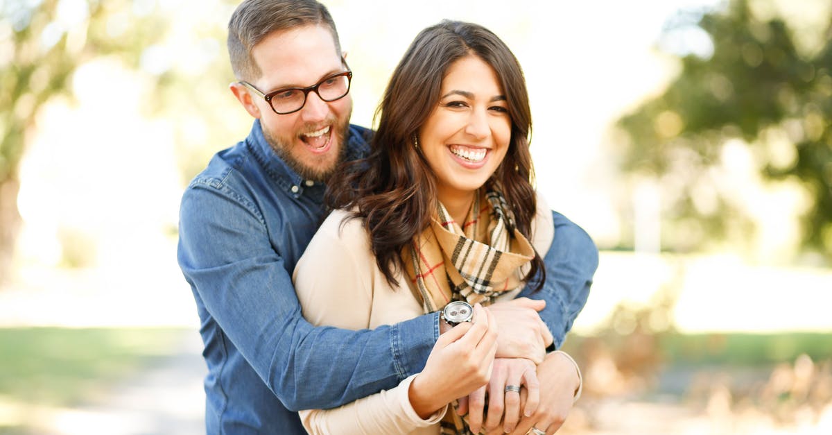 I got engaged while on an ESTA visa [closed] - Portrait of Happy Young Woman Using Mobile Phone in City