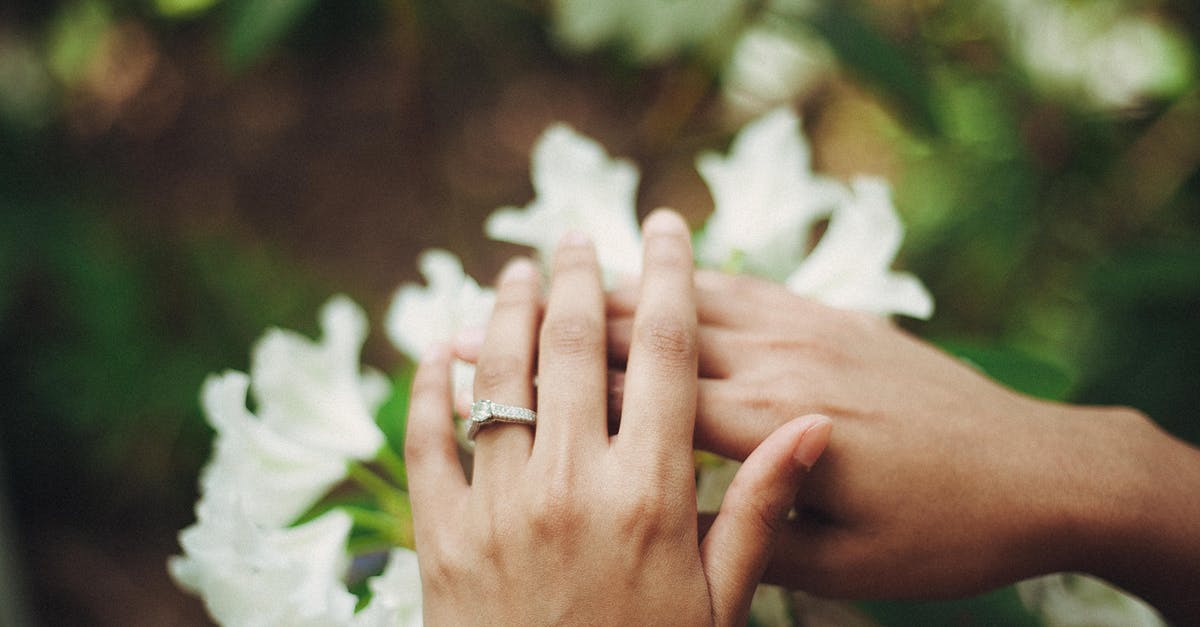 I got engaged while on an ESTA visa [closed] - Person Holding Flowers