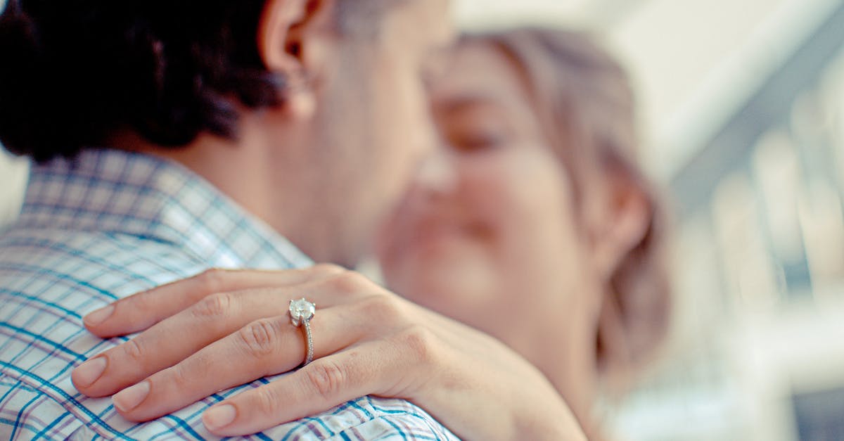 I got engaged while on an ESTA visa [closed] - Shallow Focus Photo of Man and Woman Kissing