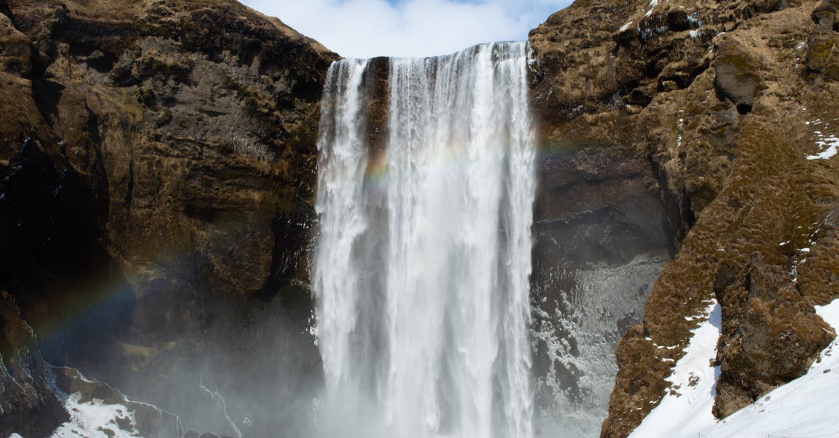 Iceland in late Autumn - Powerful waterfall in mountainous terrain