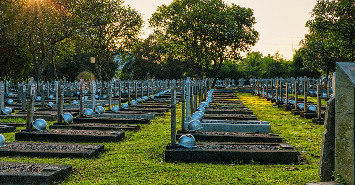 Identify location of old paintings - WWII soldier - Various military gravestones in cemetery