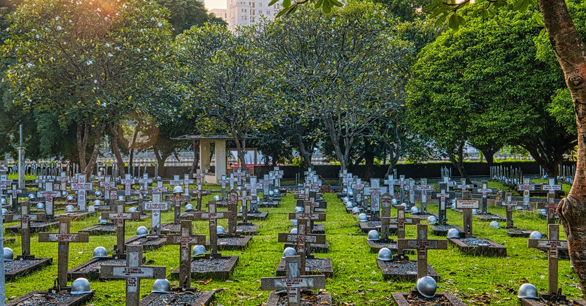 Identify location of old paintings - WWII soldier - Cemetery with gravestones and green trees