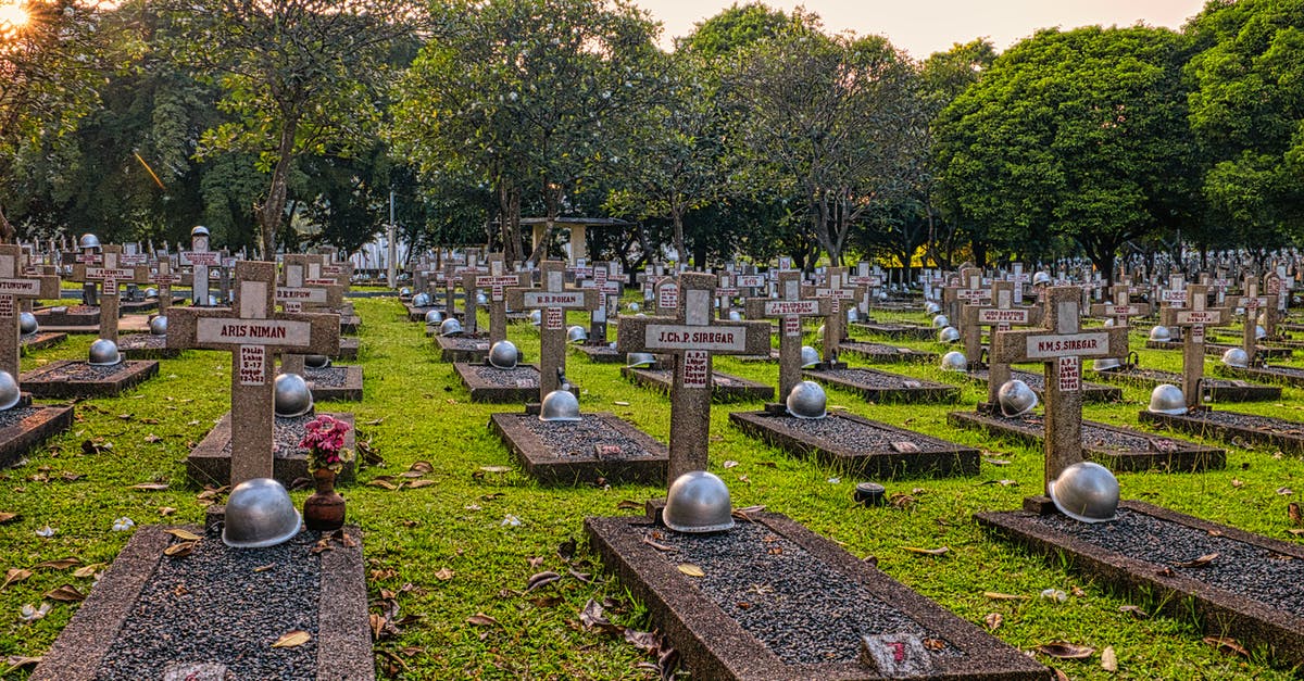 Identify location of old paintings - WWII soldier - Aged heroes cemetery with tombstones