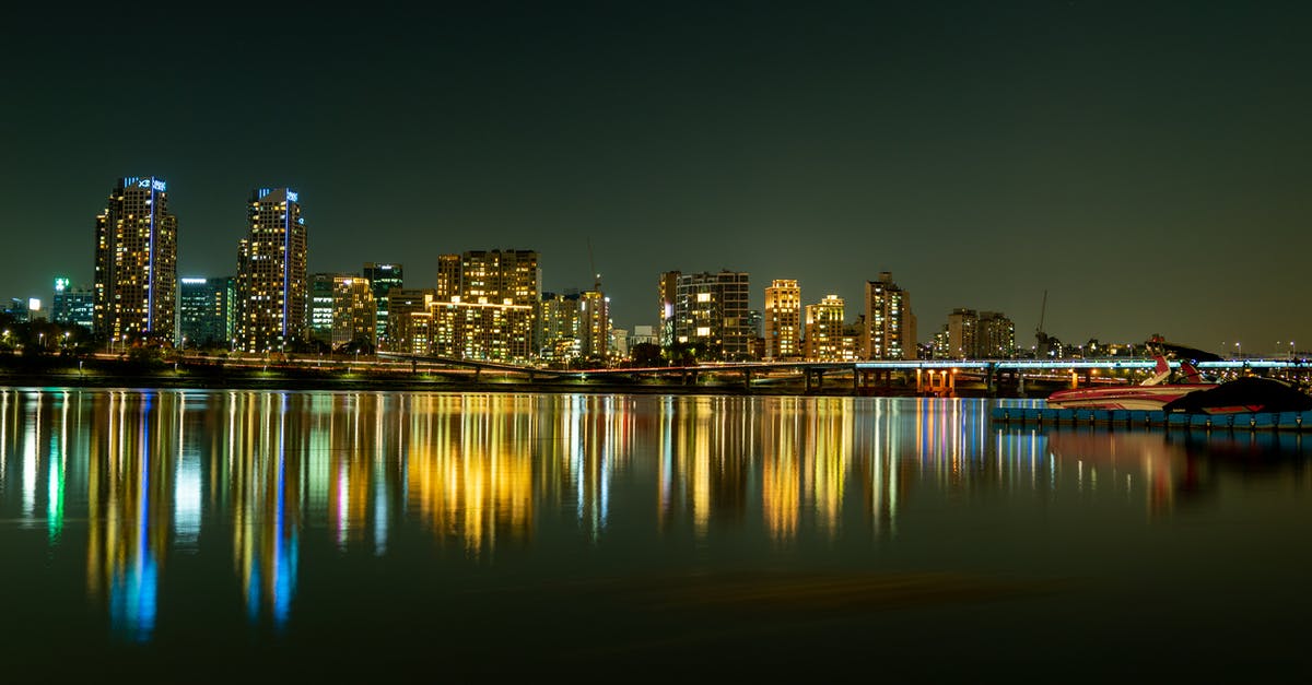 Identify waterside building / skyline - City Skyline during Night Time