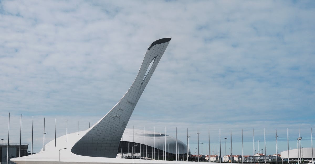 Immigration in Tirana Airport - White and Gray Building Under Blue Sky