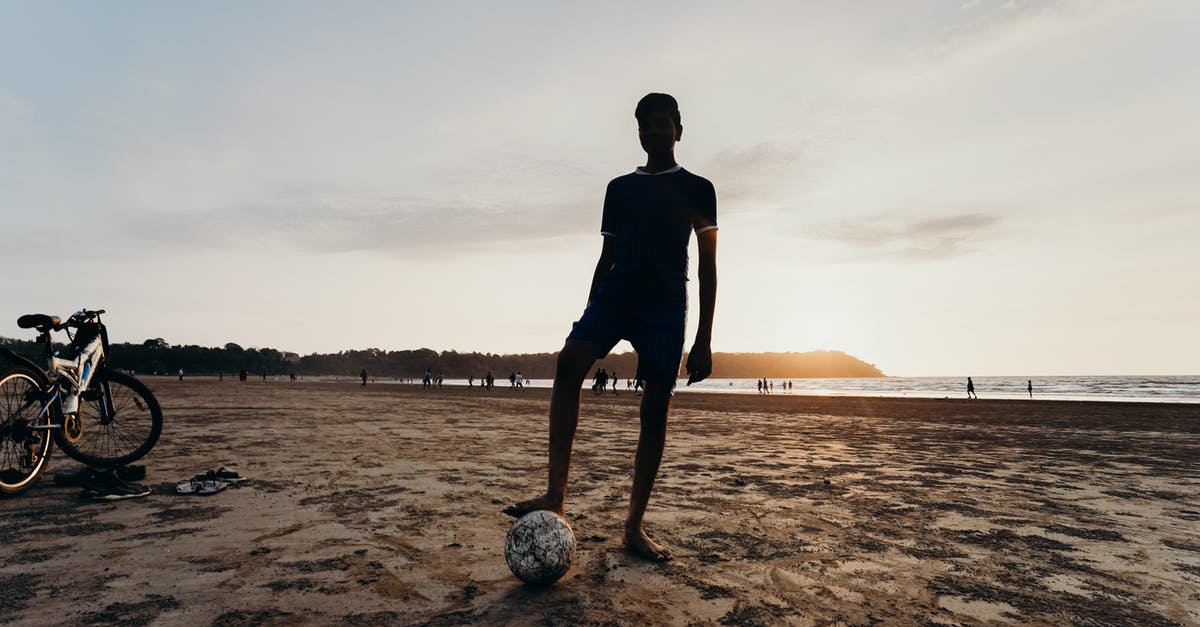 Importing a bike from India to Bangladesh [closed] - Silhouette of Man Playing Soccer on Beach during Sunset