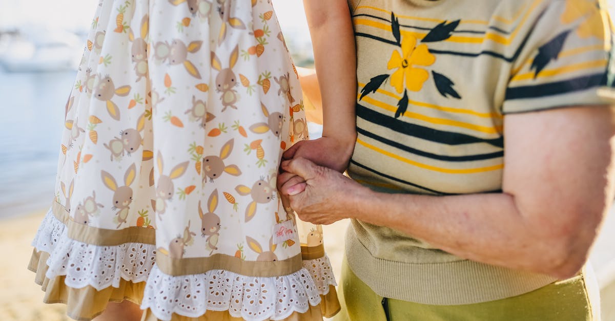 In Japan, is English more likely to be understood and spoken by young people than old people? [closed] - Grandma Holding Her Granddaughter While Walking