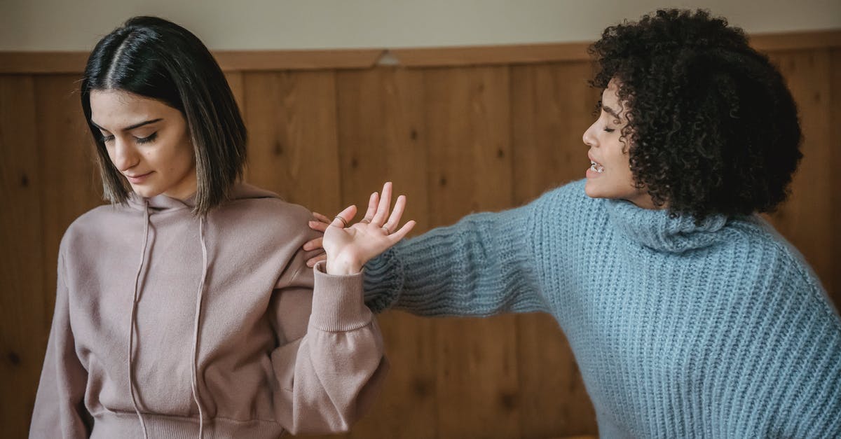 In Japan, is it considered rude to talk on the train? - Diverse women quarreling in room