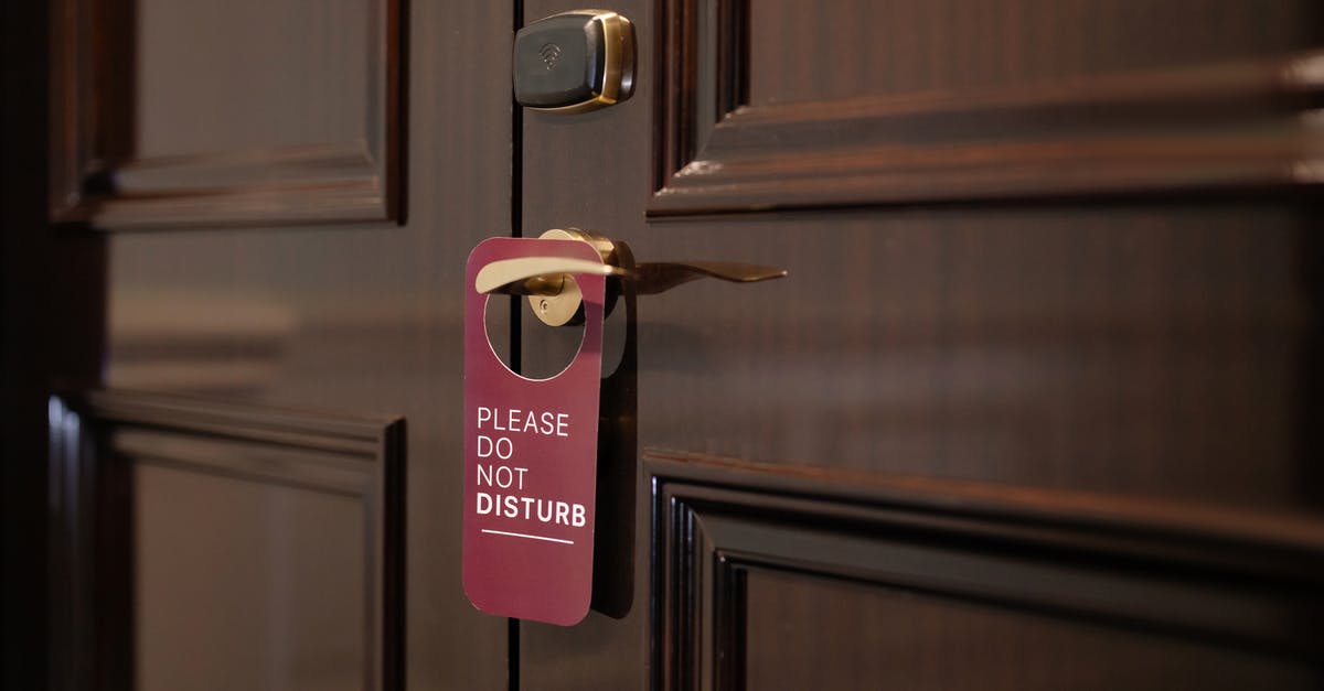 In the UK, what rights do you have if a hotel is overbooked? - Do Not Disturb Sign on Door Handle