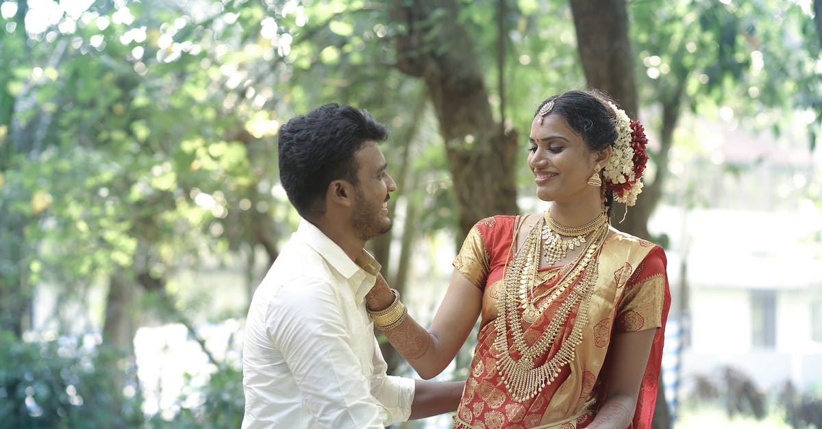 India Visa after marriage - Happy Couple Near the Tree