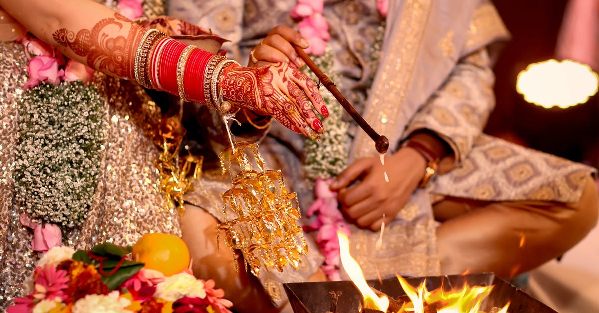 India Visa after marriage - Person Holding Stick With Candles