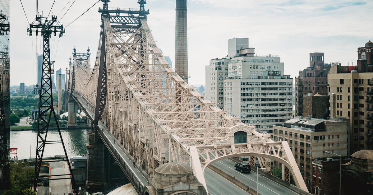 Indian Citizen crossing US to Canada by road - New York City Queensboro bridge in urban area