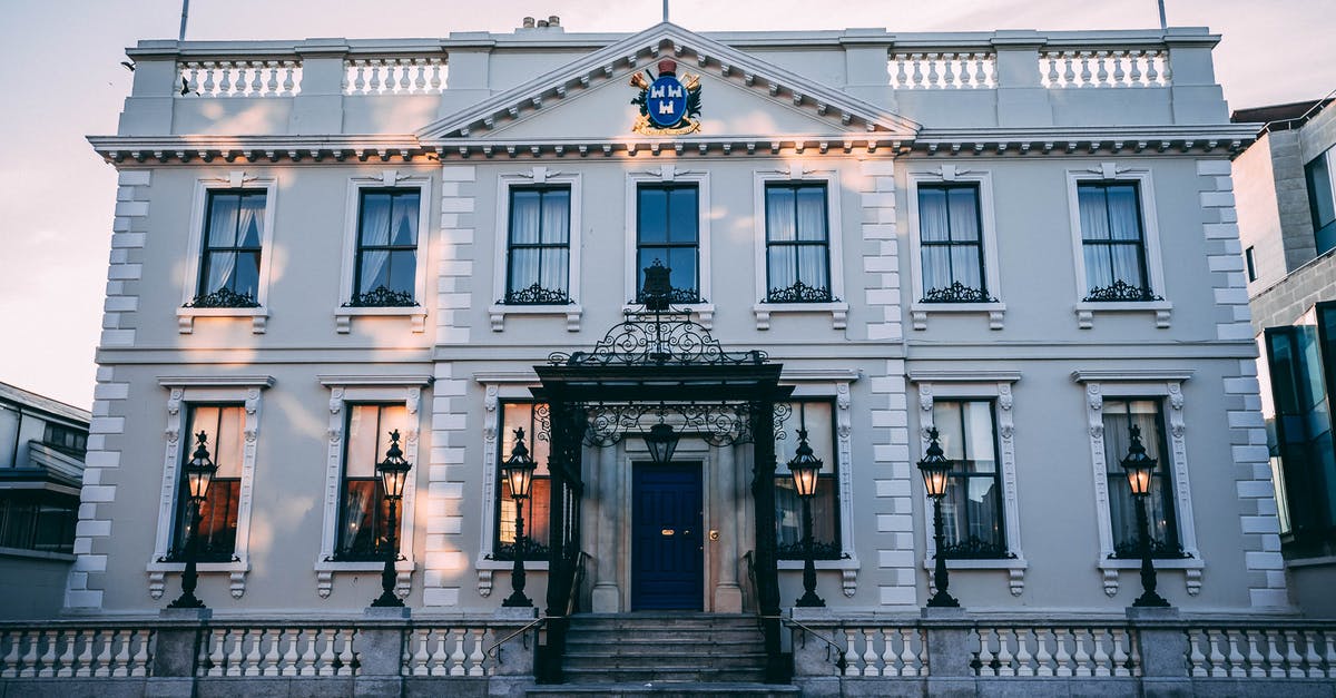 Indian citizen traveling to Dublin Ireland - Visa question - White Two-story Concrete Building Under Blue Sky