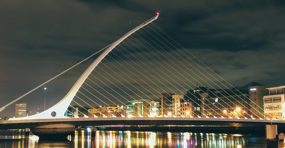 Indian traveling to Ireland via the Netherlands - Lighted Bridge over Water during Night Time