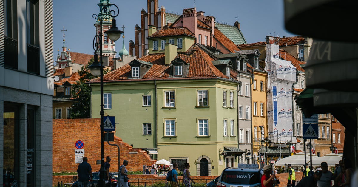 Indian traveling to Thailand with residence in Europe - Cozy residential buildings on busy street