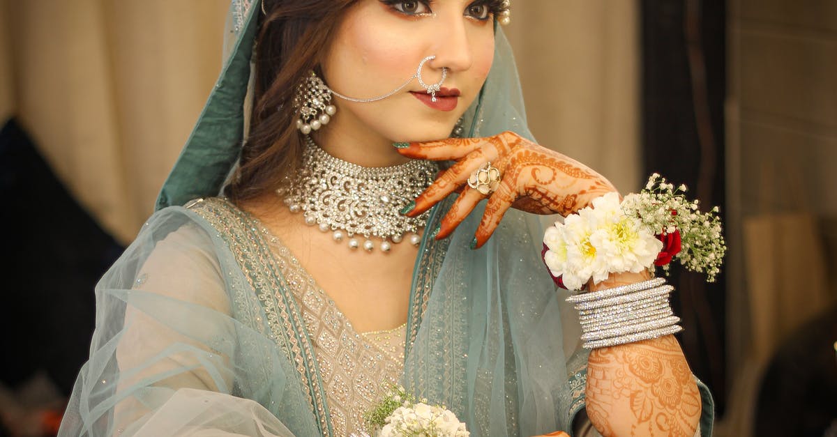 Indian visa re-entry and cancellation - Beautiful Bride in Traditional Clothing and Bridal Henna 