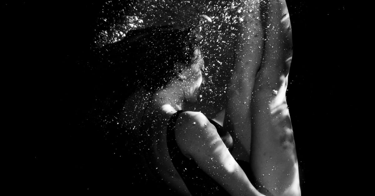 Indoor swimming in Tel Aviv. Israel? - Grayscale Photo of Womans Hand