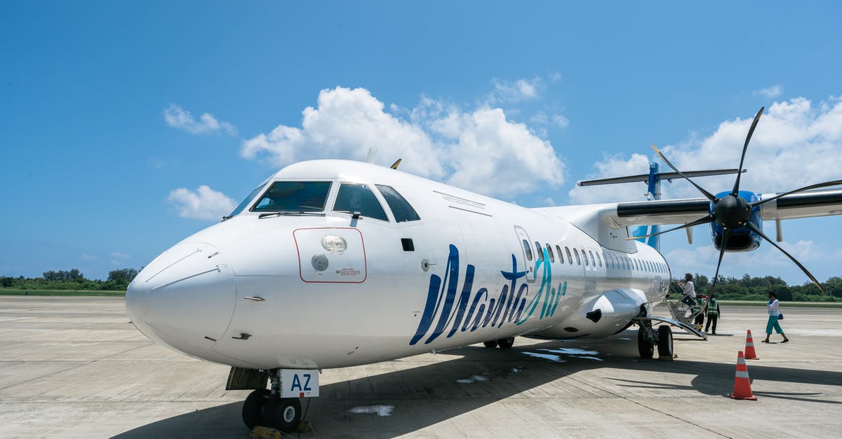 Infant boarding - White and Blue Airplane Under Blue Sky