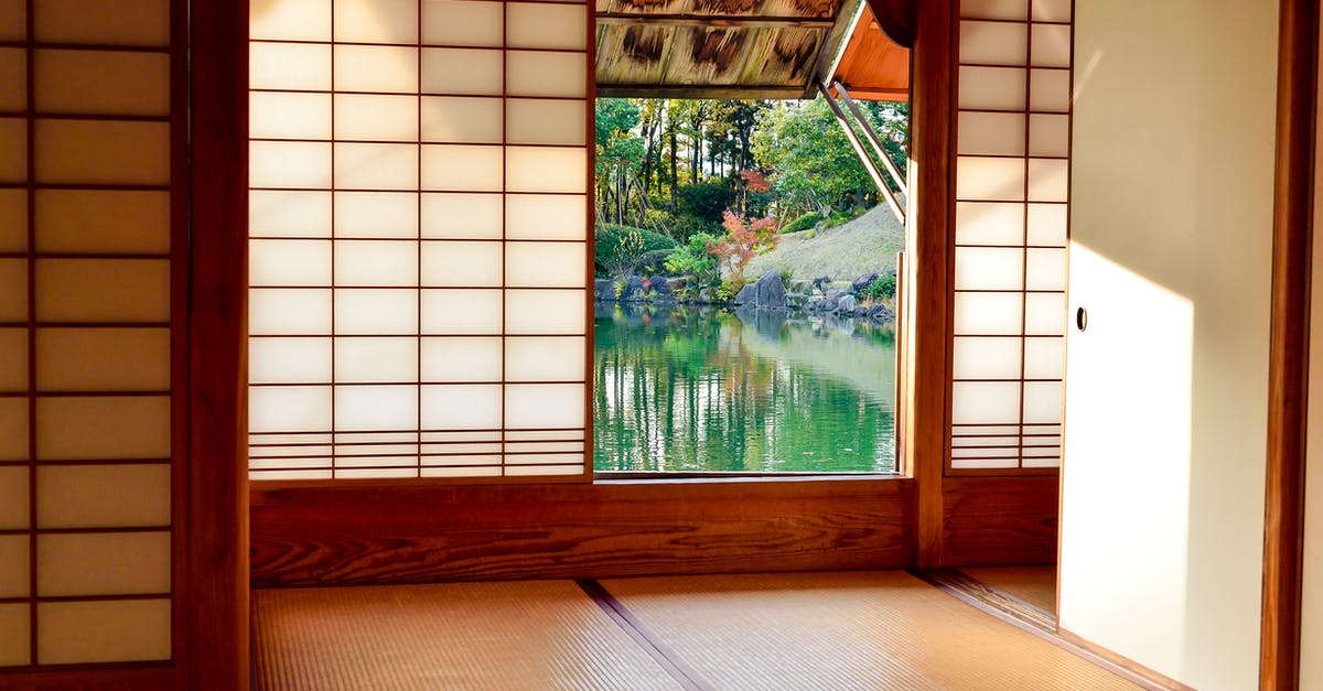 Inside Japan during the 180 days temporary visa reset - Brown Wooden Door Near Body of Water