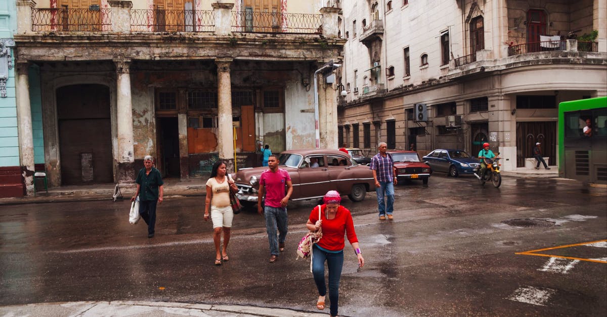 Intercity transportation in Cuba - People Walking on Street