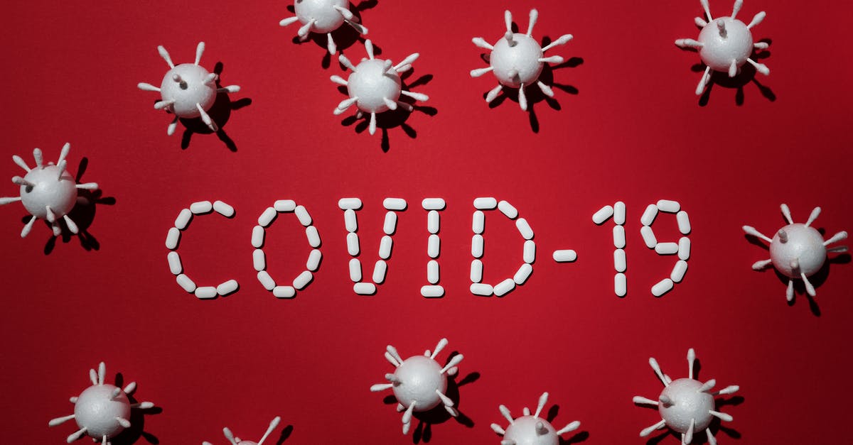 International Phone Numbers in Cell - Concept Of Covid-19 In Red Background