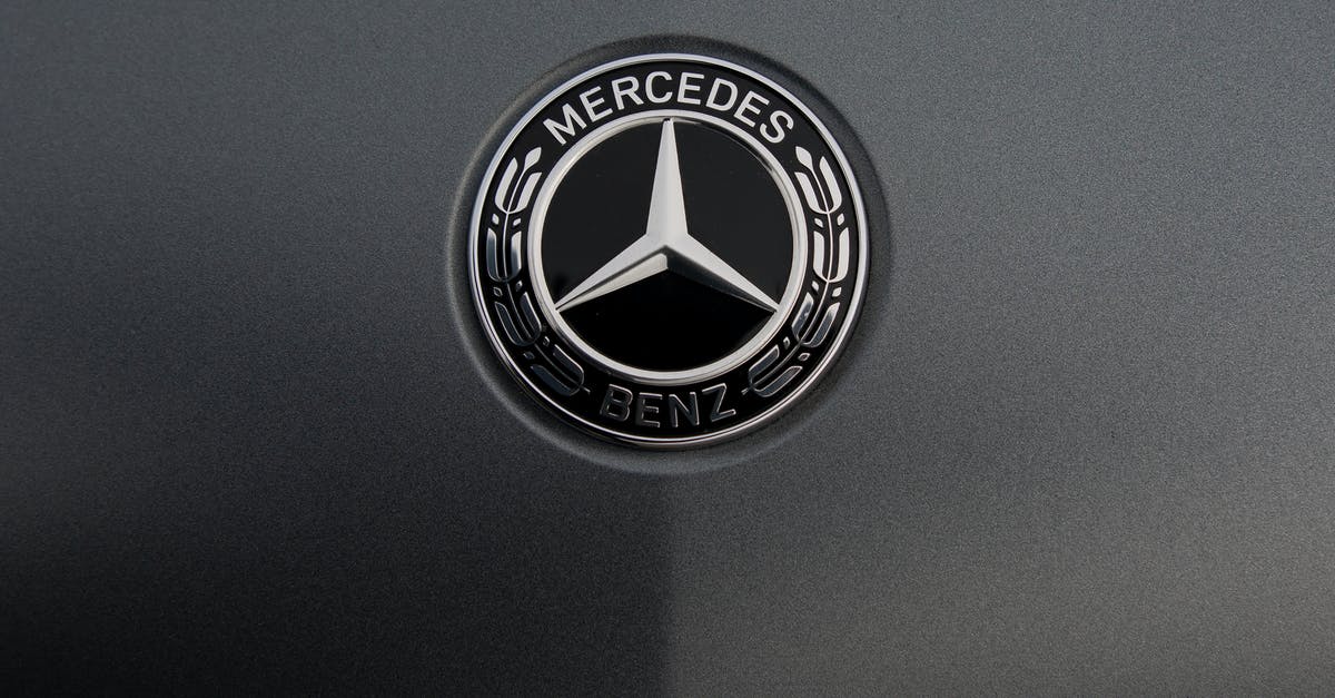 International vehicle registration sticker [closed] - Logo of famous automobile concern on dark gray background