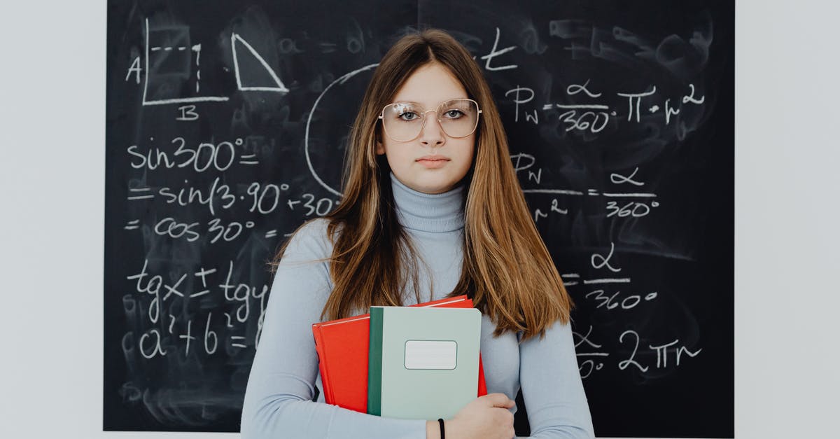 Internship in Switzerland after French student visa - Portrait of a Female Student Standing in front of a Blackboard