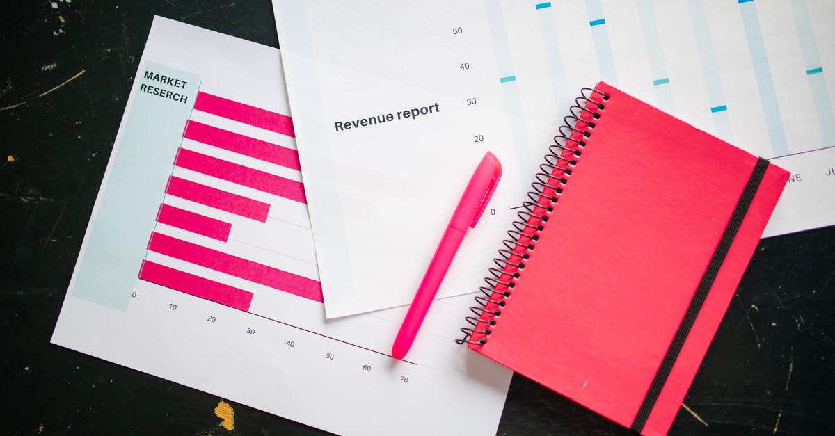 Interpreting Timatic report - Red and White Paper on Black Table