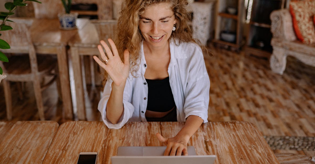 Introduction to Roman Londinium? - Photo of Woman Saying Hi Through Laptop