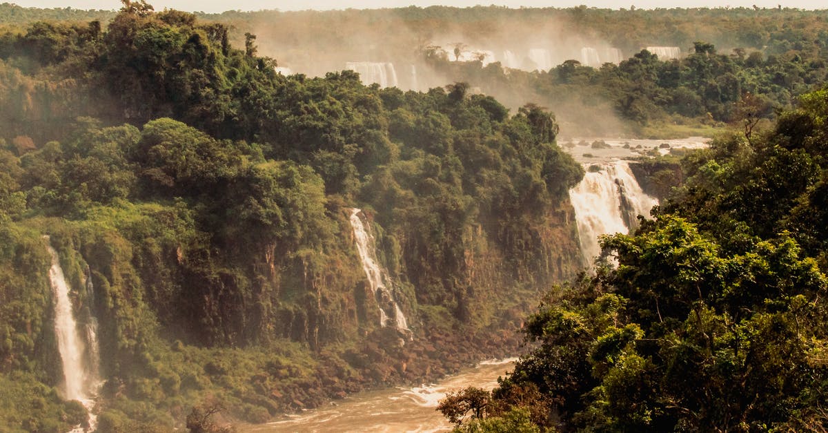 Iquitos or Puerto Maldonado, for jungle adventures in Peru? - Aerial Photography of Waterfalls on Forest