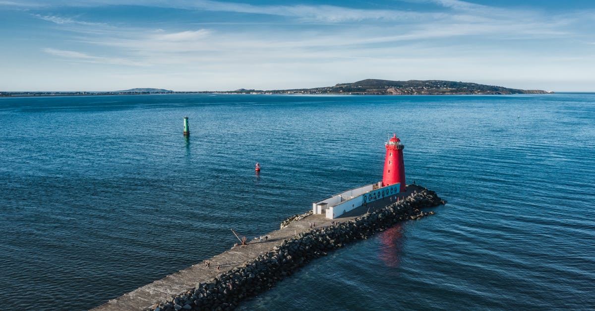 Ireland Transit Visa when flying from IND - Abu Dhabi - Dublin - US - Red and White Lighthouse Near Body of Water