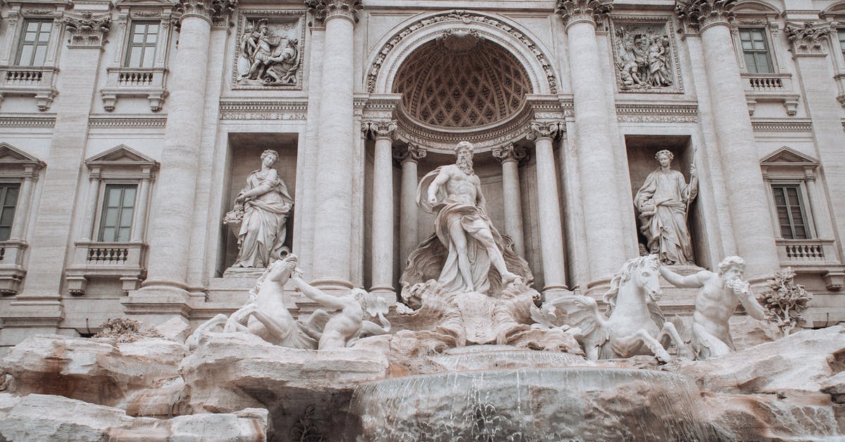 I’m Australian with a 5 year permission to stay from italy - Old fountain decorated with sculptures