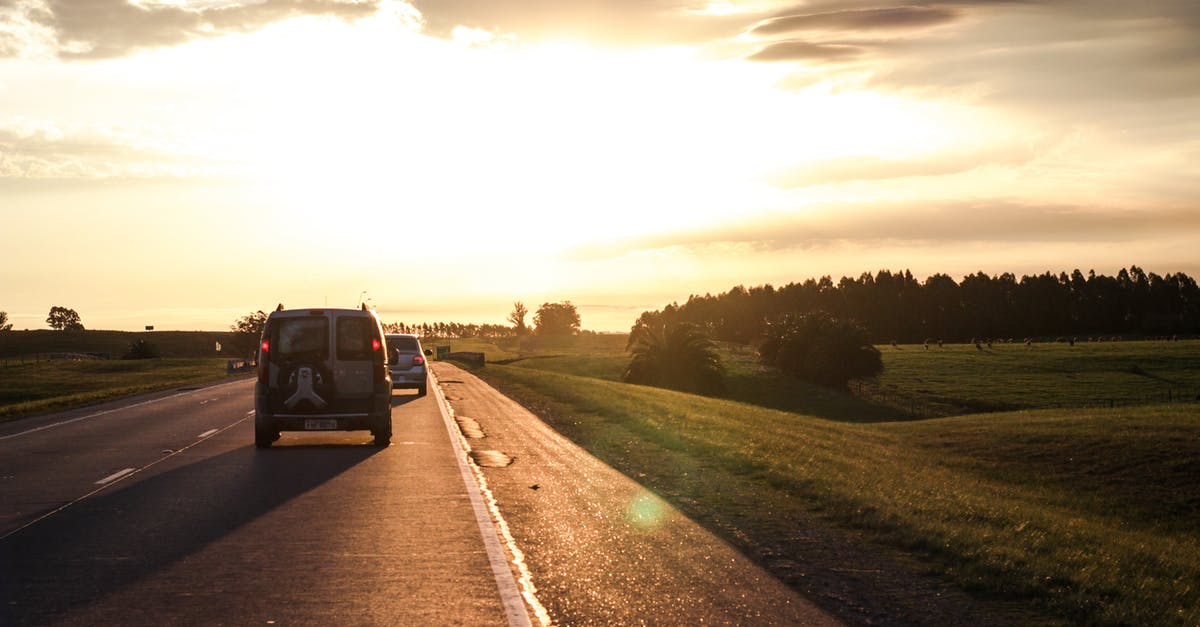 Is a 2-hour layover in Newark fine when traveling to Bombay? - Photo of Vehicles On Road During Golden Hour