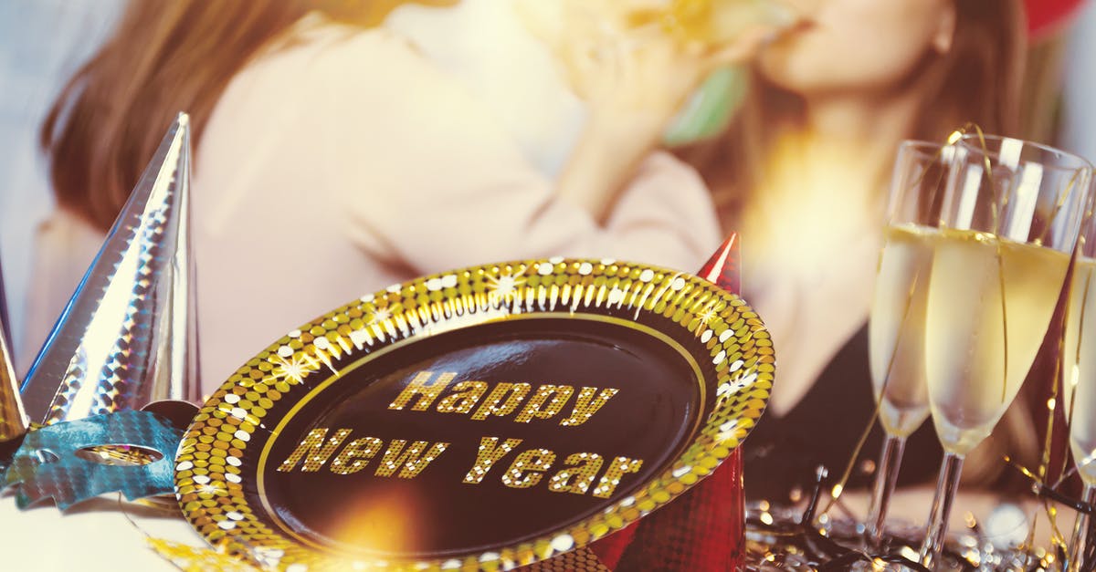 Is Broadway up on New Year's Eve and New Year's Day? - New Year party supplies on table with women drinking champagne