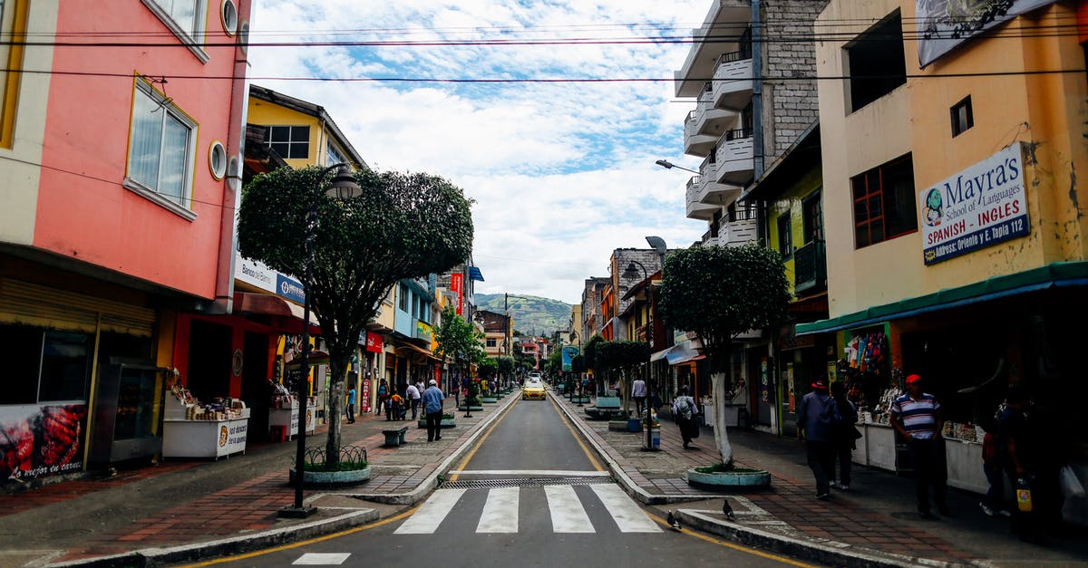 Is Ecuador visa-free for Nigerians? - Asphalt Road Between Buildings