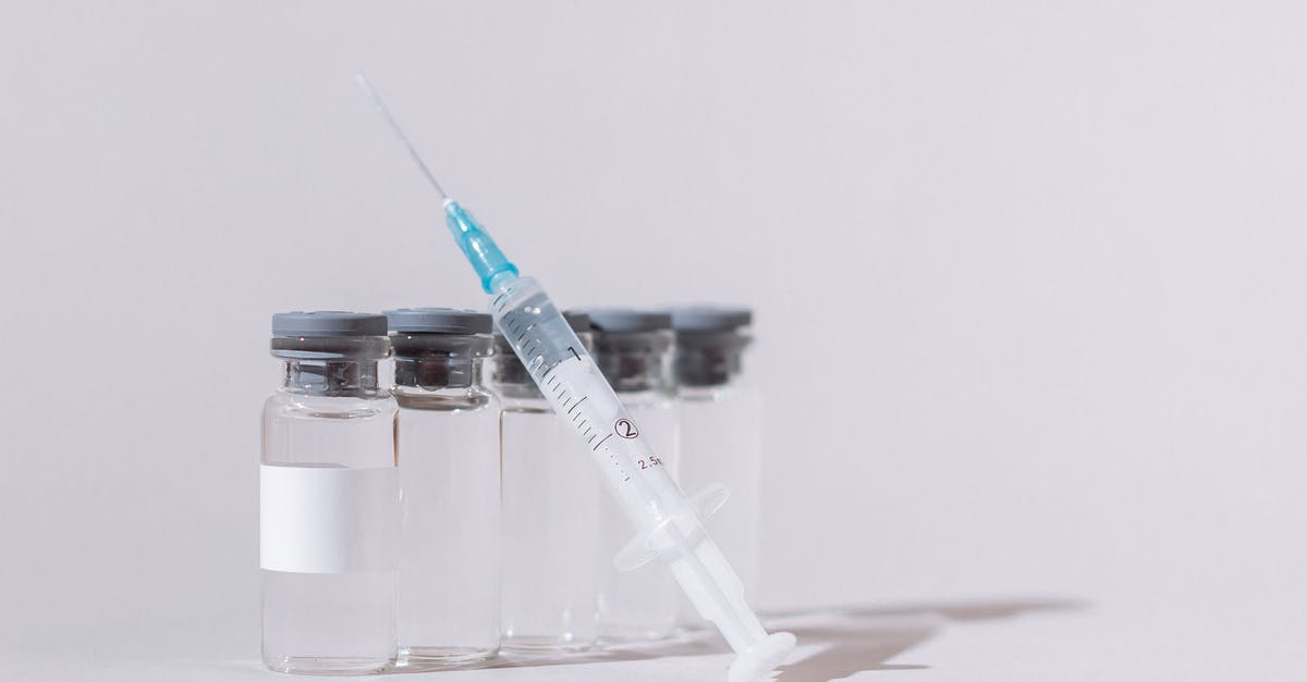 Is EU covid vaccination certificate good to enter Colombia? - Covid Vaccine Bottles and Syringe