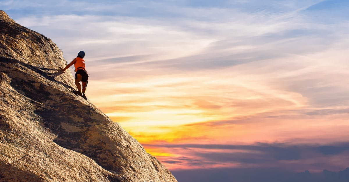 Is hiking up Ben Nevis doable with a fear of heights? - Person Climbing on Mountain