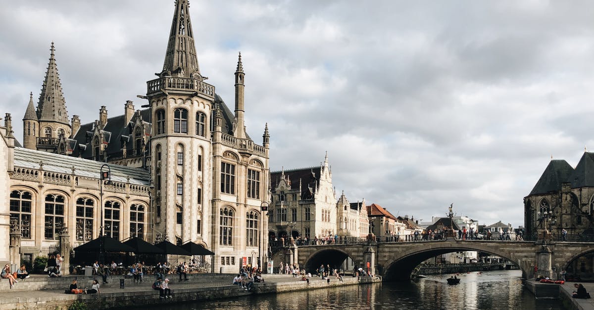 Is it a good option to visit Ghent and Bruges in the same day? - Concrete Building Near River