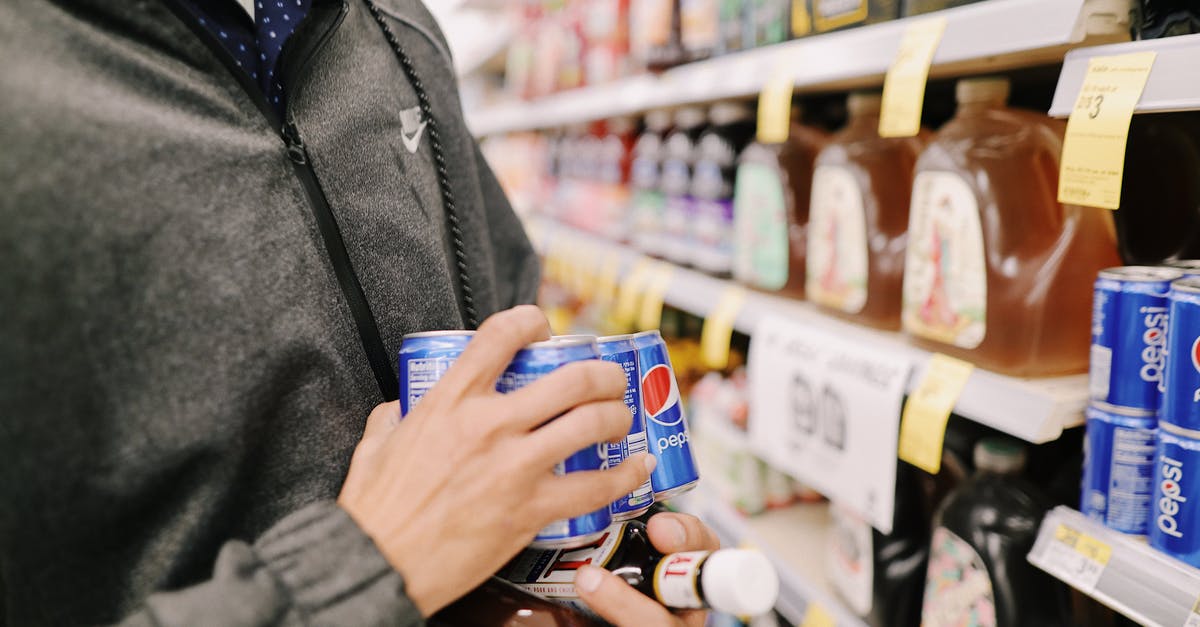 Is it allowed to bring food items to Japan? - A Person Buying From a Grocery