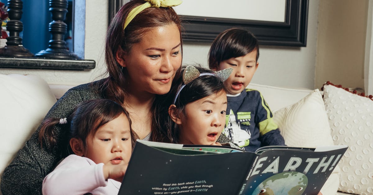 Is it always wise to book flights as soon as possible? - Woman in Green Shirt Carrying Baby