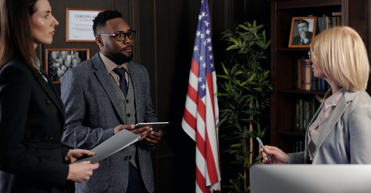 Is it legal to meet with potential future employers in the UK, whilst visiting from the USA - Lawyers Talking in an Office Is it legal to meet with potential future employers in the UK, whilst visiting from the USA - Lawyers Talking in an Office