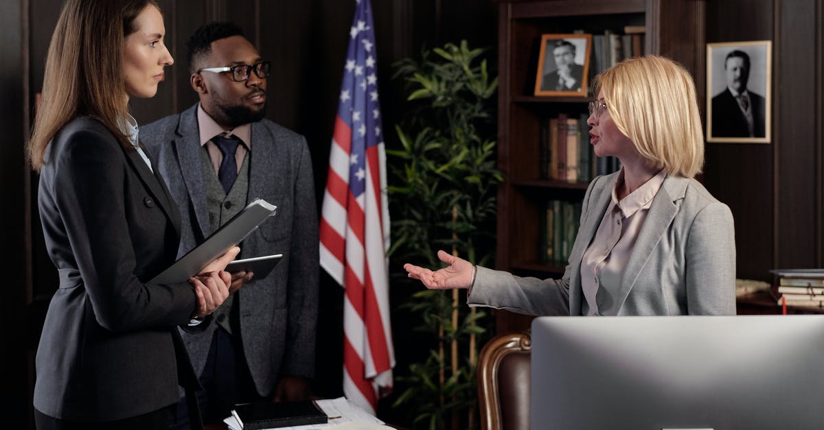Is it legal to meet with potential future employers in the UK, whilst visiting from the USA - Lawyers Talking in an Office Is it legal to meet with potential future employers in the UK, whilst visiting from the USA - Lawyers Talking in an Office
