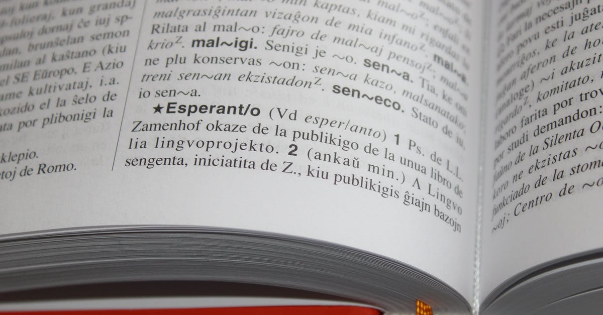 Is it mandatory to have a language speaker of both inbound and outbound countries' languages onboard flights? - Page of a Dictionary in Close-up Photography