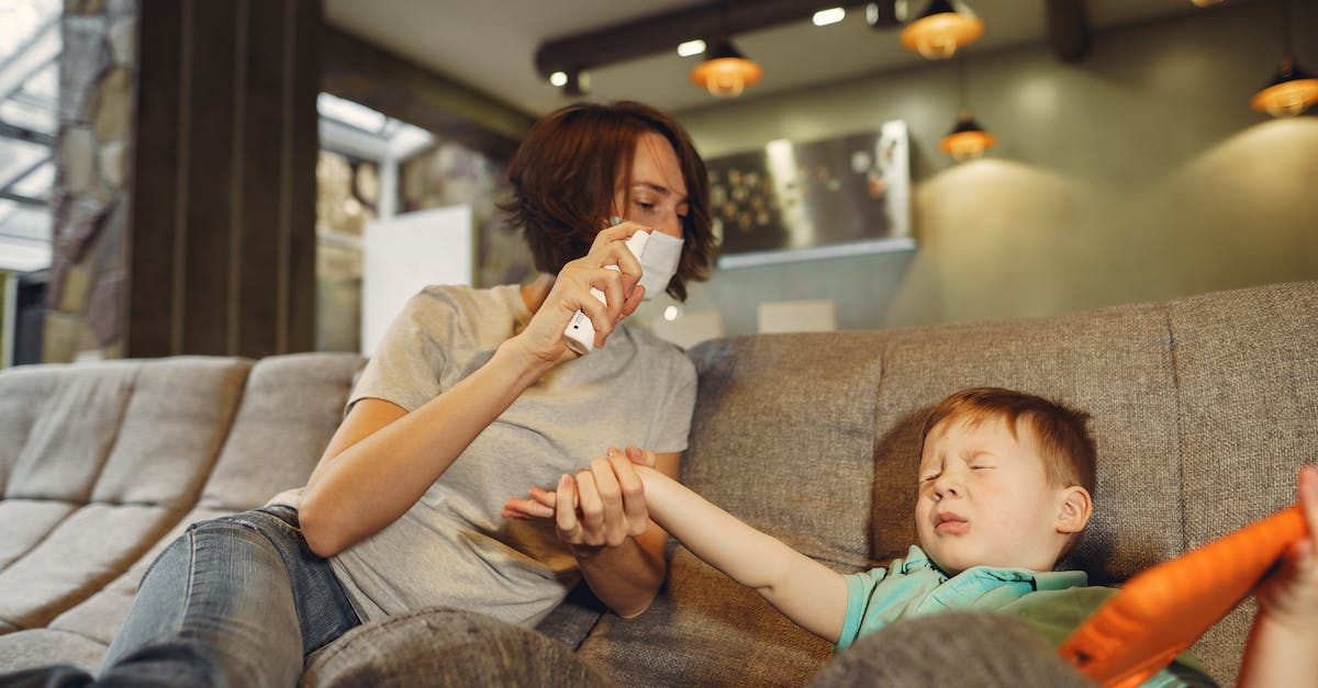 Is it possible to carry pepper spray for self-defense? [closed] - Mother with spray taking hand of wrinkled son at home