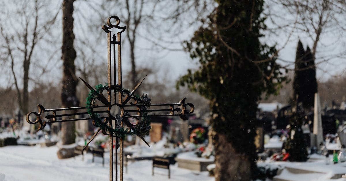 Is it possible to cross the Naruto Strait on foot? - Metal Crucifix in a Snowy Cemetery