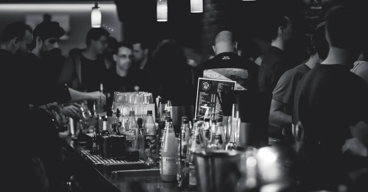 Is it possible to drink alcoholic beverages at Iranian ski resorts? - Grayscale Photography of Bottles on Top of Table Is it possible to drink alcoholic beverages at Iranian ski resorts? - Grayscale Photography of Bottles on Top of Table