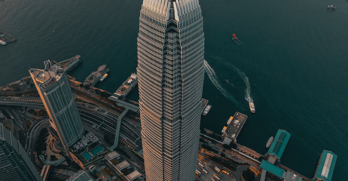 Is it possible to go from South Korea to Hong Kong by sea? - Geometric skyscraper located in city downtown at seafront
