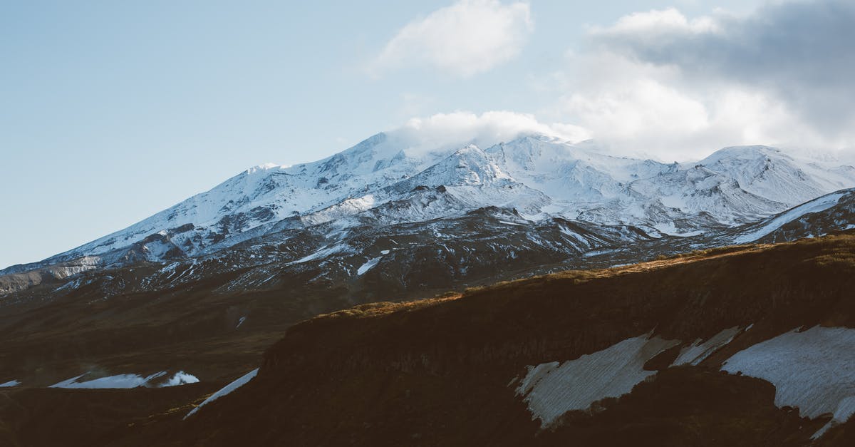 Is it possible to hike the Carpathian Mountains as a 2 or 3 day trip staying in Poland? - Snowy mountain ridge shrouded in clouds Is it possible to hike the Carpathian Mountains as a 2 or 3 day trip staying in Poland? - Snowy mountain ridge shrouded in clouds